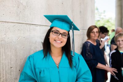 Graduate student smiling at the camera