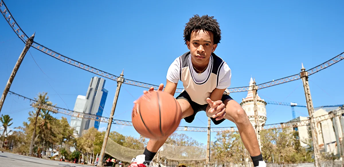 Student playing basket